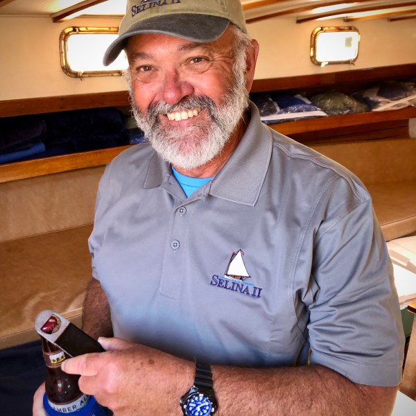 Sail Selina custom embroidered logo on baseball caps, coozies, koozies, and top quailty polo shirts