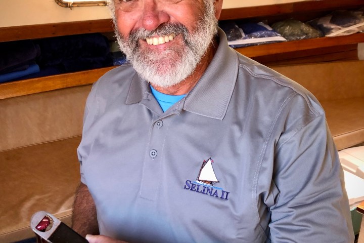 Sail Selina custom embroidered logo on baseball caps, coozies, koozies, and top quailty polo shirts