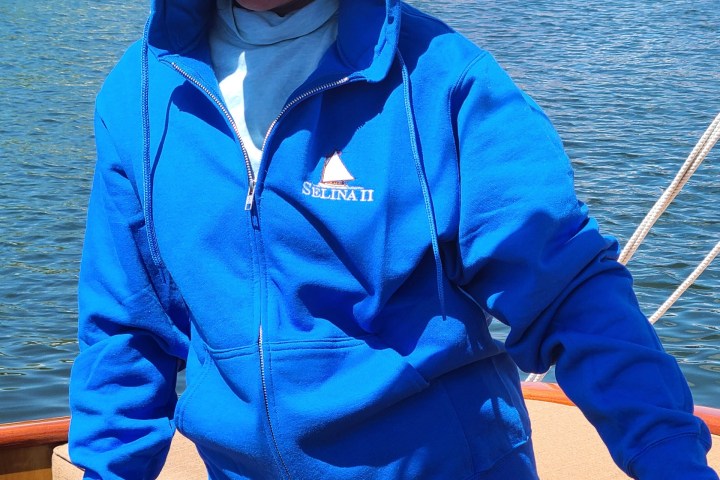 Sail Selina St Michaels custom embroidered logo on a royal blue zip hoodie abailable for sale in our ships store