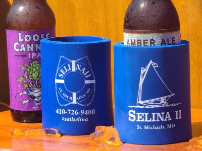 a bottle of wine and a glass of beer on a table