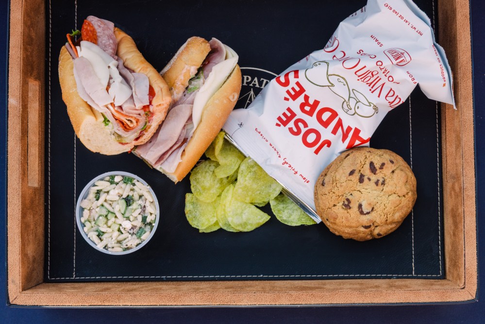 Tray with sandwich, chips, coleslaw, cookie, and a bag of Joe Sandwiches.